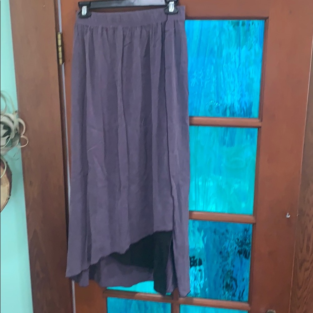 XiAo purple skirt, some black detailing on front.